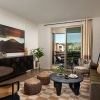 living room with a couch coffee table and tv